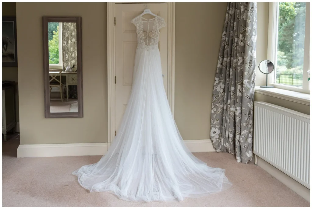 Jo Malone perfume box along side the brides lacy wedding pumps