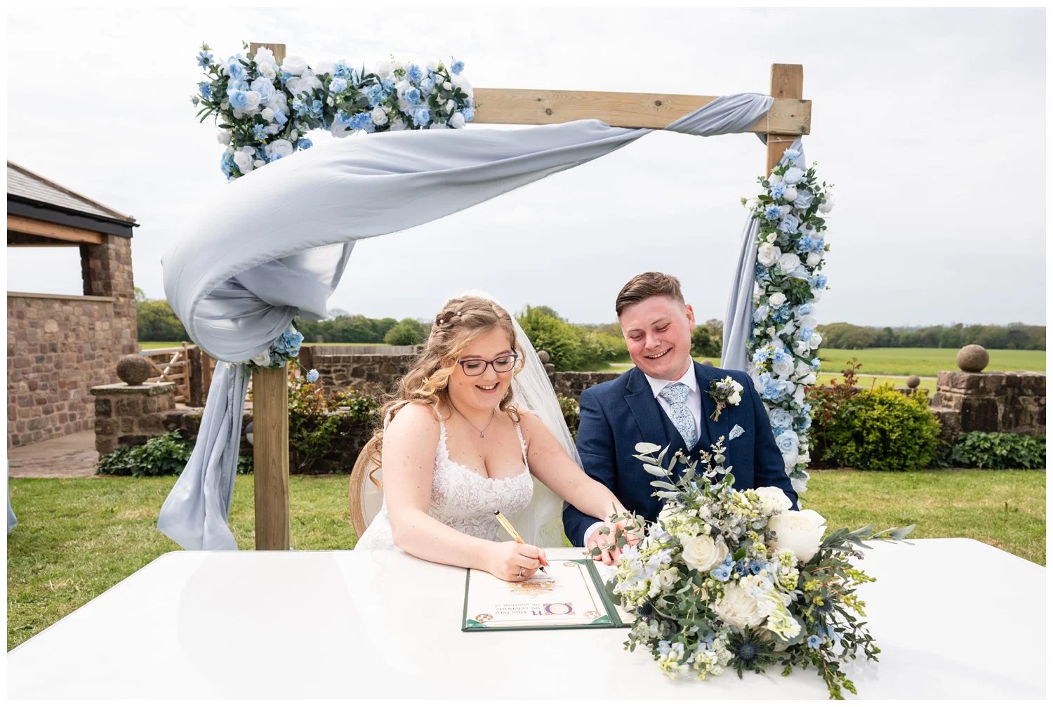 Signing of the register bride and groom