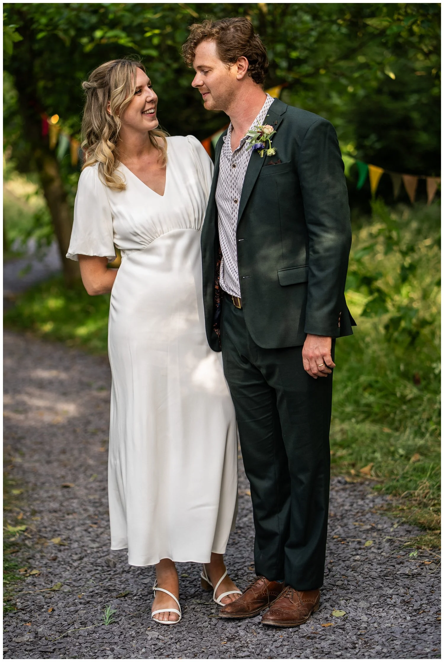 Bride and groom portraits amongst the woodland.
