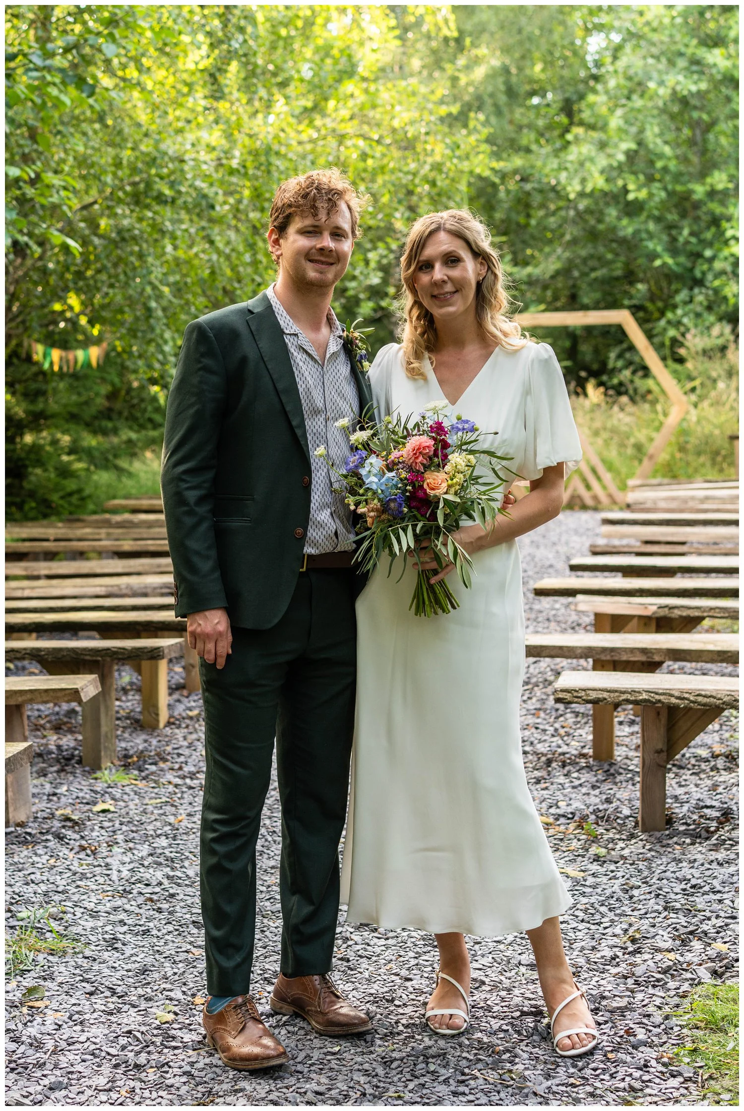 Bride and groom portraits amongst the woodland at Bowland Tipi's