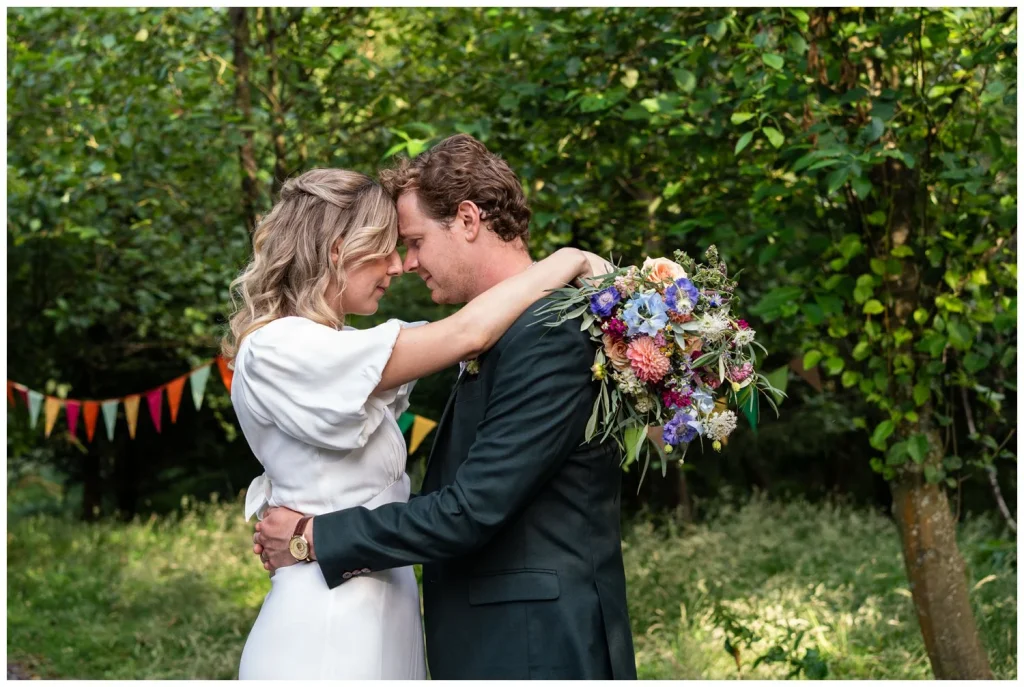 Bride and groom portraits amongst the woodland.