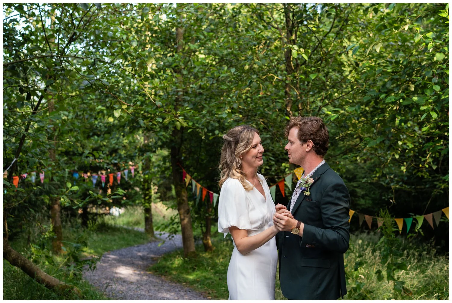 Bride and groom portraits amongst the woodland at Bowland Tipi's