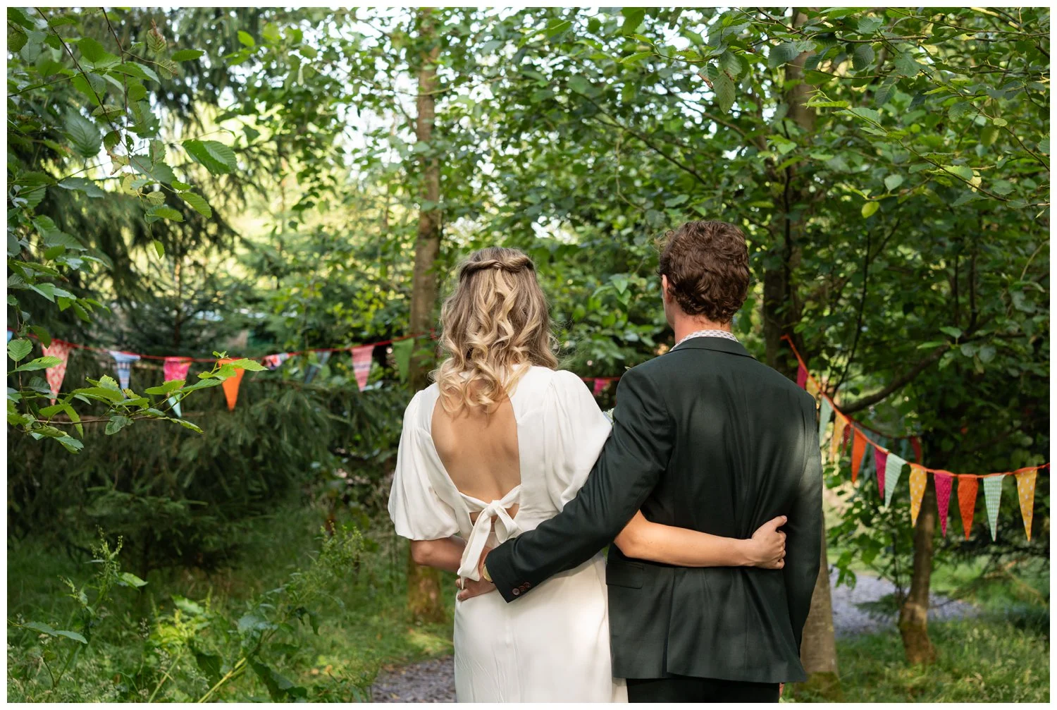 Bride and groom portraits amongst the woodland at Bowland Tipi's